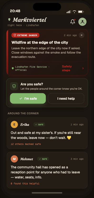 A Snakken neighbourhood feed: a red 'Extreme danger' wildfire-evacuation banner pinned at the top, and below it a hyperlocal 'Are you safe?' status with 'I'm safe' and 'I need help' buttons.